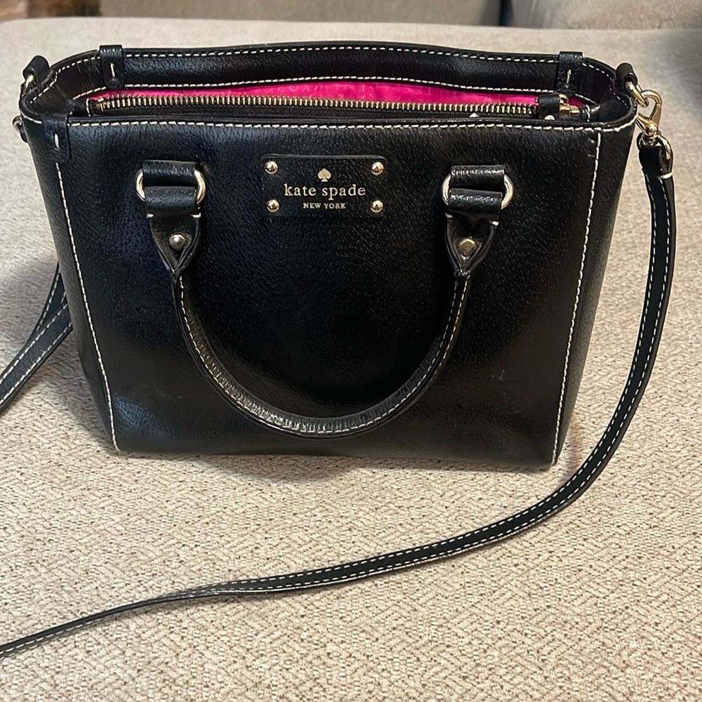 Black with hot pink interior Kate Spade small hand bag.